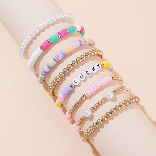 Vacation Multicolor Letter Plaid Gold Plated Imitation Pearl Soft Clay Wholesale Bracelets