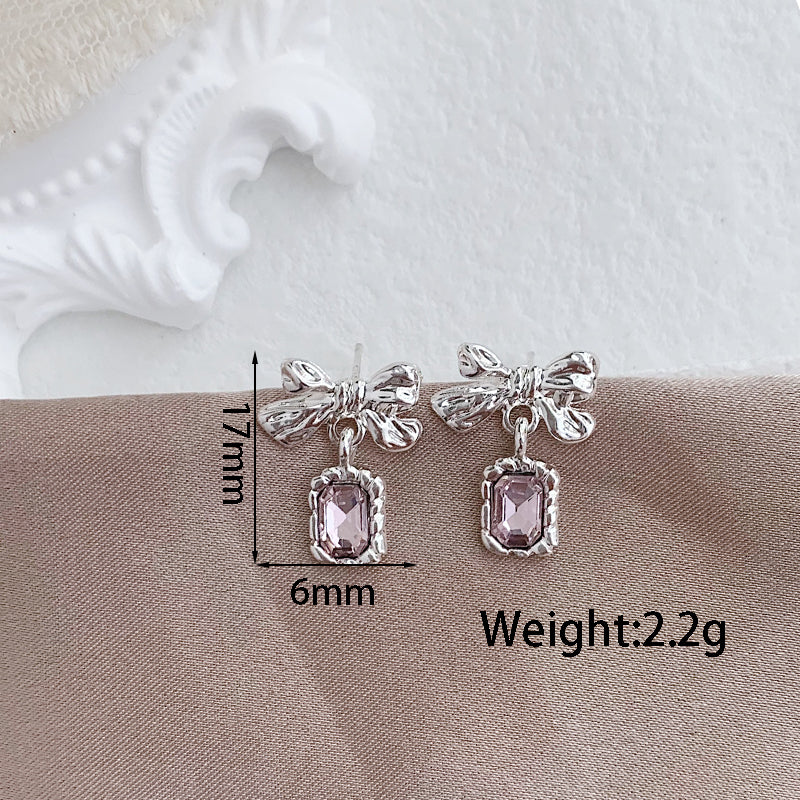 1 Pair Elegant Lady Bow Knot Inlay Alloy Artificial Rhinestones Gold Plated Drop Earrings