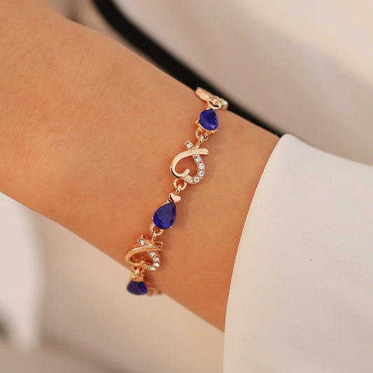Wholesale Heart Shaped Copper Lady Bracelet With Hollow Out Elegant Flower And Diamond Embedded Design
