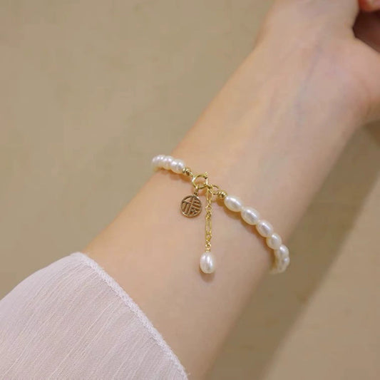 Women's Copper Natural Freshwater Pearl Bracelet With Hangable Pendant In Rice And Droplet Shapes 14K Gold Injected Trendy Design