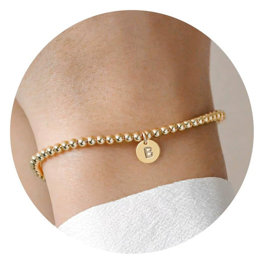 Women's Minimalist Copper Bead Bracelet With Gold Electroplated Letter Charms Round Disc Pendant And Elastic Beaded String