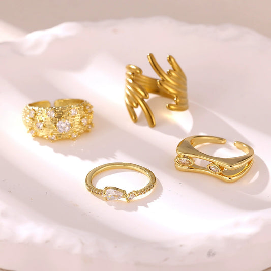 Women's Minimalist Geometric Bow Ring In Goldplated Copper With A Wideface Design And Diamondencrusted Detail