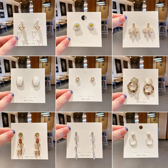 1 Pair Elegant Simple Style Streetwear Geometric Star Bow Knot Inlay Alloy Artificial Rhinestones Artificial Pearls Drop Earrings