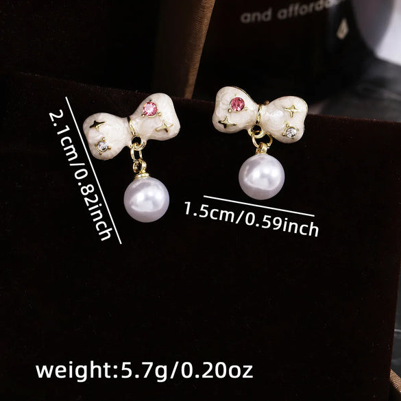 1 Pair Simple Style Bow Knot Inlay Zinc Alloy Rhinestones Drop Earrings