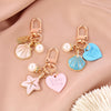 1 Piece Cartoon Style Letter Heart Shape Metal Inlay Artificial Pearls Rhinestones Women'S Keychain