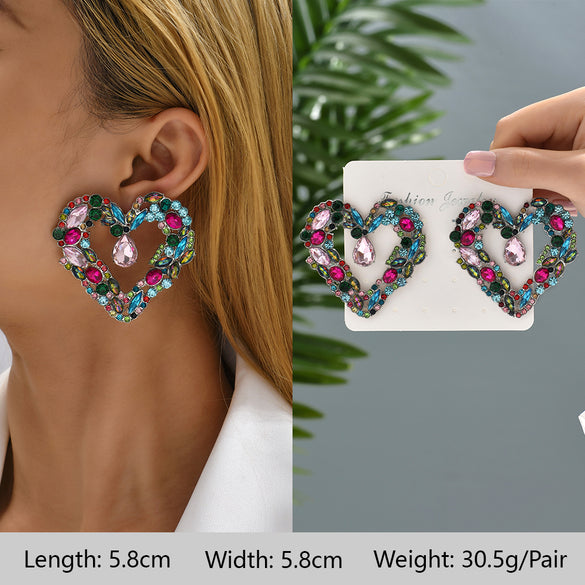 1 Pair Exaggerated Luxurious Shiny Round Heart Shape Wings Plating Inlay Copper Alloy Zinc Alloy Rhinestones Glass Ear Studs