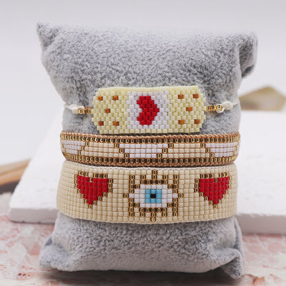 Casual Simple Style Triangle Devil's Eye Heart Shape Glass Rope Knitting Women's Drawstring Bracelets