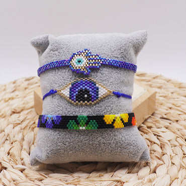 Hip-Hop Vintage Style Devil's Eye Palm Flower Glass Knitting Women's Bracelets
