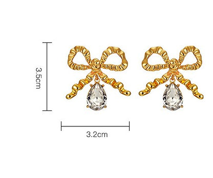 Copper Simple Style Classic Style Bow Knot Inlay Artificial Gemstones Earrings