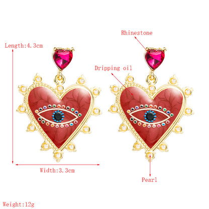 Heart-shaped Devil's Eyes Pearl Alloy Earrings