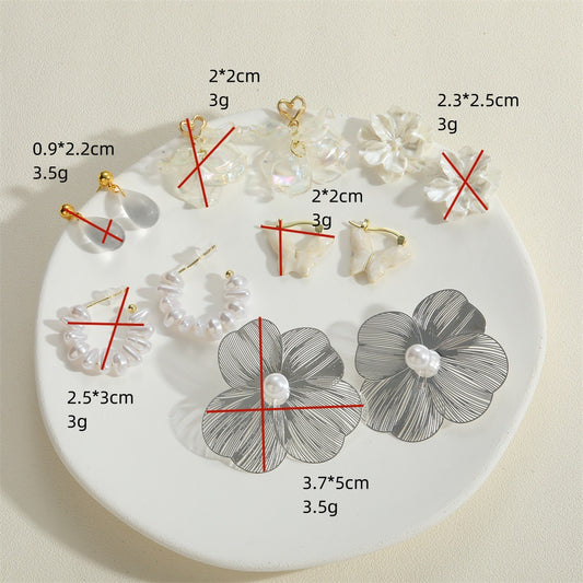 European and American hot-selling flowers, alloys, personality, trend, trend earrings, cross-border new products, water drop design, simple light luxury earrings for women