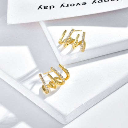 S925 Silver Pin Fashion Design Sense 18K Gold Zircon Four Claw Earrings Wholesale European and American Diamond Temperament Claw Stud Earrings