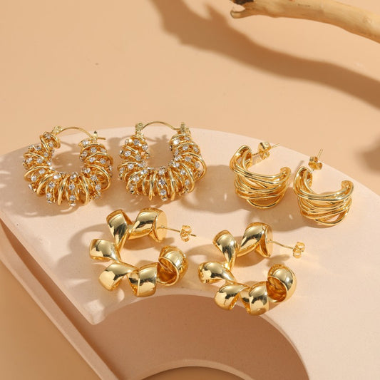 Cross-border hot-selling twist C-shaped zircon earring earrings, light luxury style, Internet celebrity personality, simple copper plated 14K real gold ears
