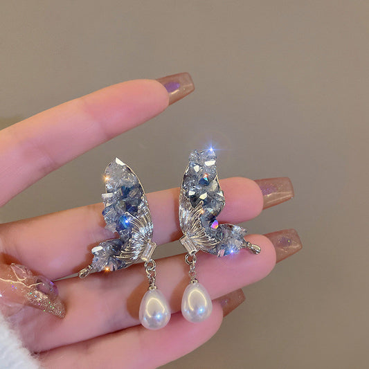 Super fairy butterfly wings pearl stud earrings women's tide niche exquisite design sense of high-end earrings light luxury temperament ear jewelry