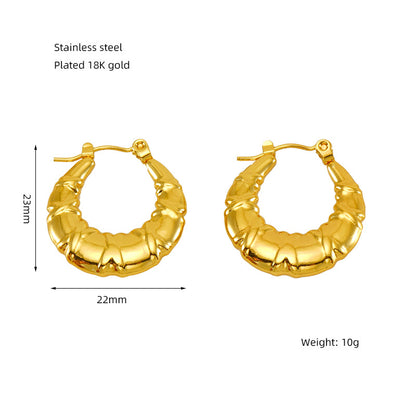 European and American cross-border titanium steel round earrings women's high-end INS style niche design 18K stainless steel stud earrings buckle women