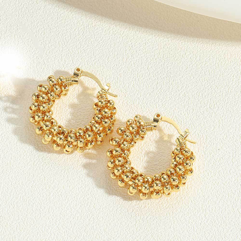 AliExpress hot-selling copper plated 14K real gold C-type twist earrings ins Internet celebrity style simple and versatile exquisite earrings for women