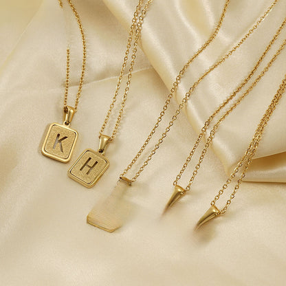 Summer European and American titanium steel hollow 26 English letter pendant 18K stainless steel gold sand letter clavicle chain necklace women