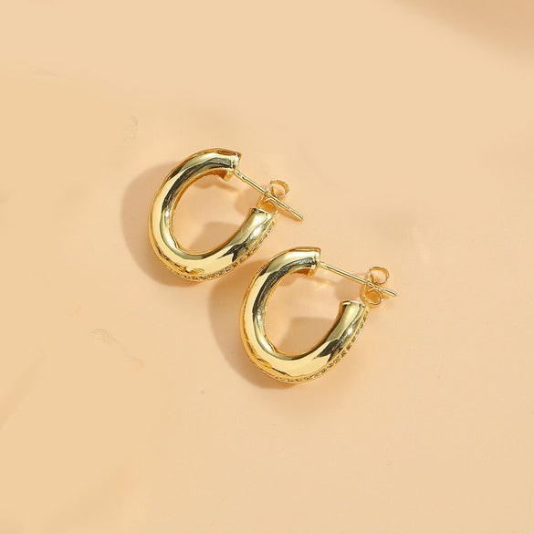 Cross-border hot-selling light luxury, high-end football-type design, textured earrings, niche and versatile, ins-style personalized earrings for women