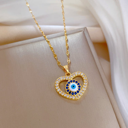 Retro Devil's Eye Heart Shape Titanium Steel Copper Inlay Artificial Gemstones Pendant Necklace