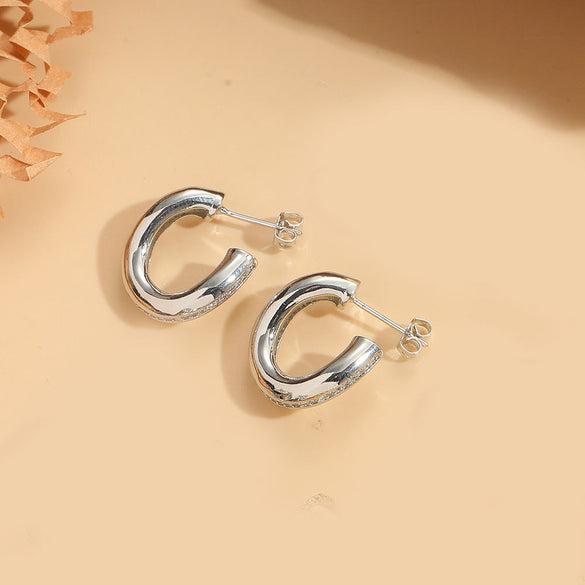 Cross-border hot-selling light luxury, high-end football-type design, textured earrings, niche and versatile, ins-style personalized earrings for women