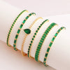 Adjustable Women's Jewelry Pull Bracelet With Green Zircon And Real Gold Plated Cross