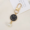 Allmatch Alloy Keychain Pendant With Oil Dropping Flower And Smiley Patterns Semimanual Design