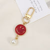 Allmatch Alloy Keychain Pendant With Oil Dropping Flower And Smiley Patterns Semimanual Design