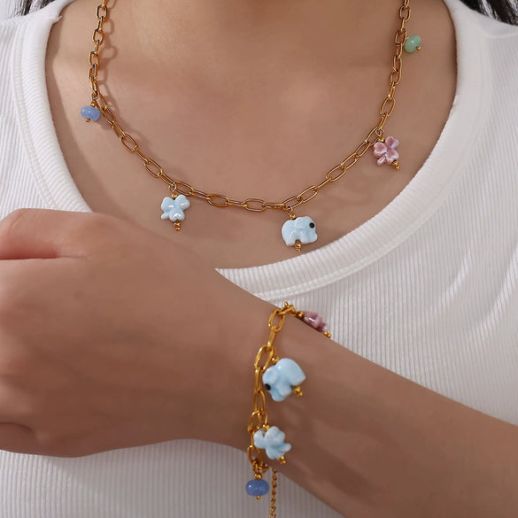 Allmatch 316L Stainless Steel Gold Ceramic Natural Stone Elephant Design Electroplated Necklace For Women
