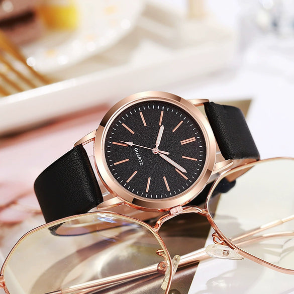 Alloy And Imitation Leather Fashion Women's Round Dial Quartz Watch
