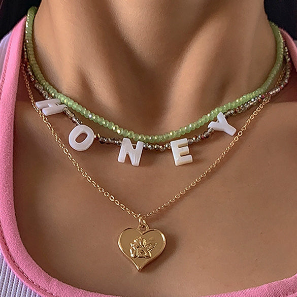 Alloy Bead Letter Stacked Heartshaped Pendant Collarbone Necklace For Women With Geometric Pattern And Electroplating Treatment
