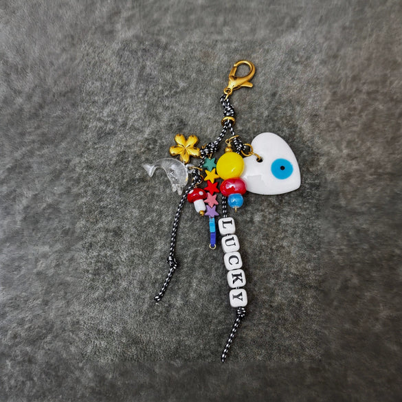 Alloy Beaded Doll Bag Pendant With Geometric Style Heart Water Drop Bell Patterns And Electroplating Processing