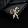 Alloy Bow Hollow Pearl Diamond Brooch Electroplated Lovely Style For Female And Unisex