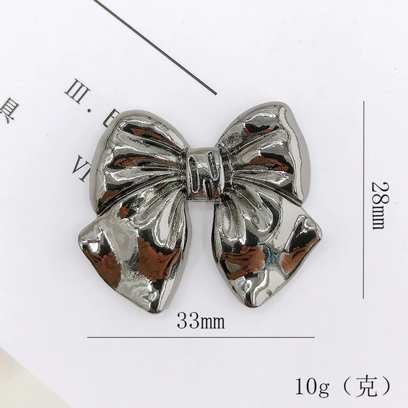 Alloy Bow Mobile Phone Shell And Garment Accessories Electroplated