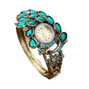 Alloy Bracelet Watch Women's Fashion Round Dial Diamondencrusted Peacock Quartz Hollow Design