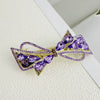 Alloy Crystal Spring Hairpin For Women With Bow Design And Electroplating Processing