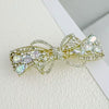 Alloy Crystal Spring Hairpin For Women With Bow Design And Electroplating Processing