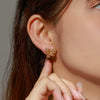 Alloy Electroplated Retro Cut Out Bow Elegant Women's Earrings