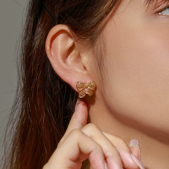 Alloy Electroplated Retro Cut Out Bow Elegant Women's Earrings