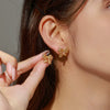 Alloy Electroplated Retro Cut Out Bow Elegant Women's Earrings