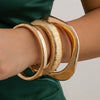 Alloy Exaggerated Geometric Electroplated Spring Bracelet