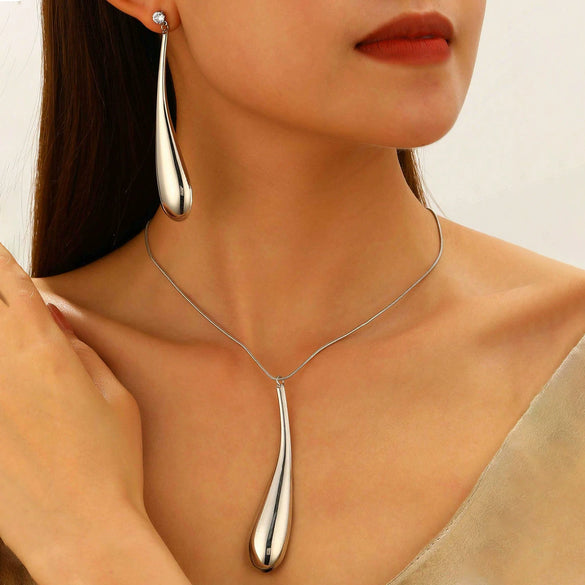 Alloy Exaggerated Punk Style Love Drop Bell Earrings And Necklace With Electroplating
