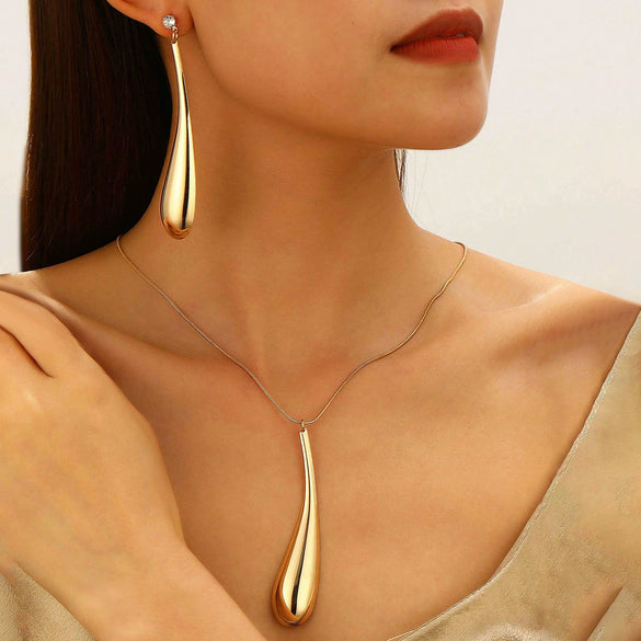 Alloy Exaggerated Punk Style Love Drop Bell Earrings And Necklace With Electroplating