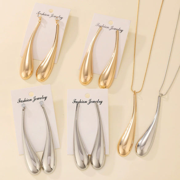 Alloy Exaggerated Punk Style Love Drop Bell Earrings And Necklace With Electroplating