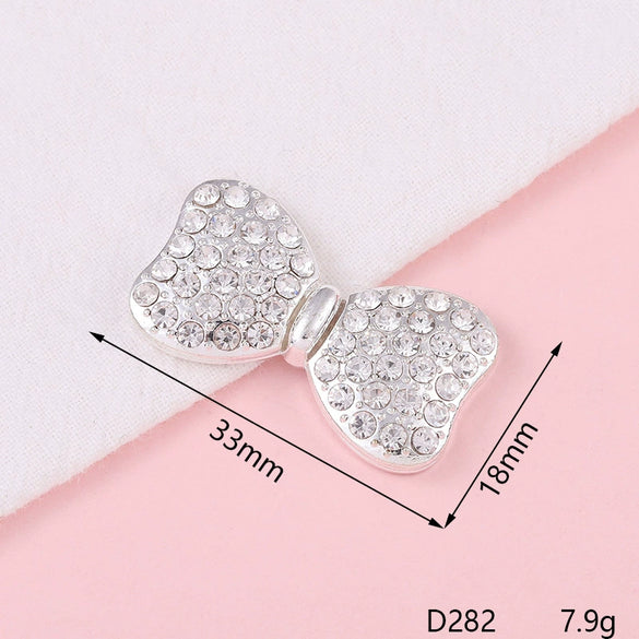 Alloy Fashion Bow Style Painted Mobile Phone Case Jewelry Accessories With Electroplating