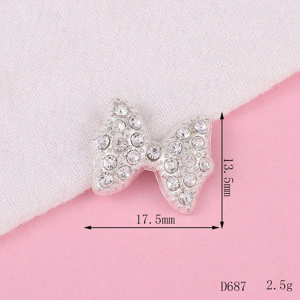 Alloy Fashion Bow Style Painted Mobile Phone Case Jewelry Accessories With Electroplating