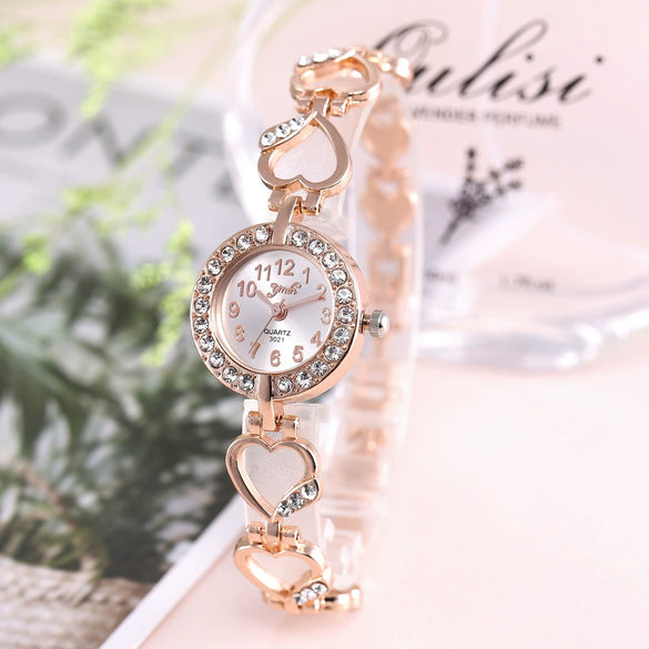 Alloy Fashion Heart String Bracelet Women's Quartz Watch With Round Dial
