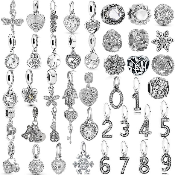 Alloy Fourleaf Clover Hollow Pendant Jewelry Diy Accessories With Totem Pattern And Electroplating Treatment