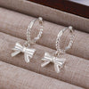 Alloy Geometric Bow Swirl Rivet Gothic Punk Style Women's Earrings Electroplated