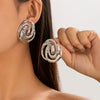 Alloy Geometric Conch Symbol Exaggerated Spiral Pattern Vintage Style Electroplated Women's Earrings