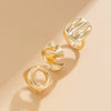 Alloy Geometric Hollow Twist Hug Ring For Women With Electroplating